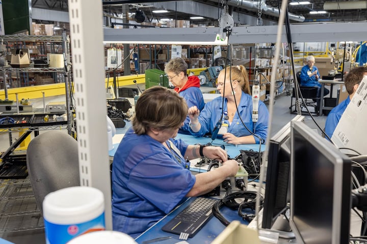 Assemblers at RIS work in individual cells to complete whole sections of products.