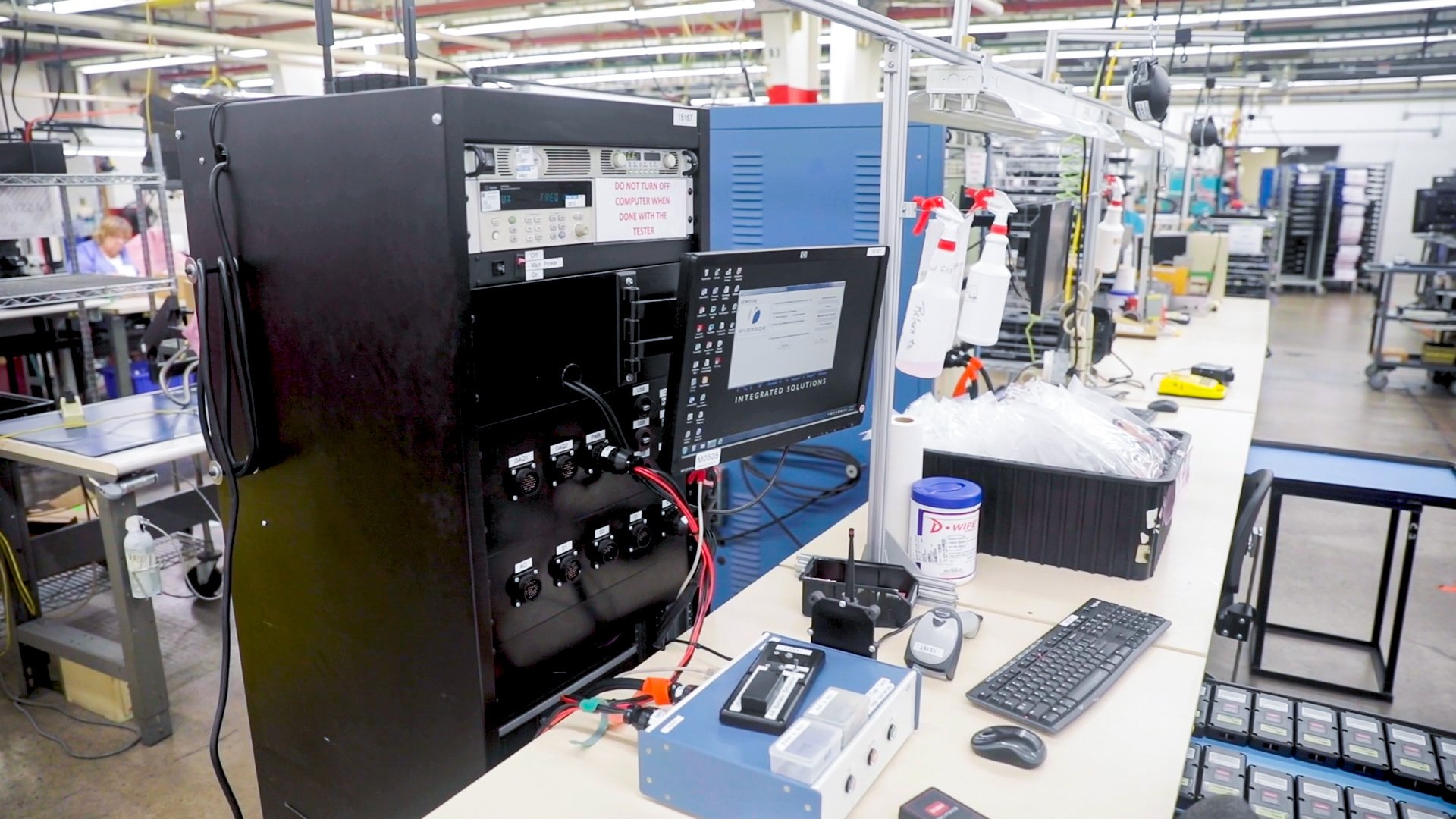 A large, custom-built functional test fixture at RIS tests to see how assemblies will perform in the field.