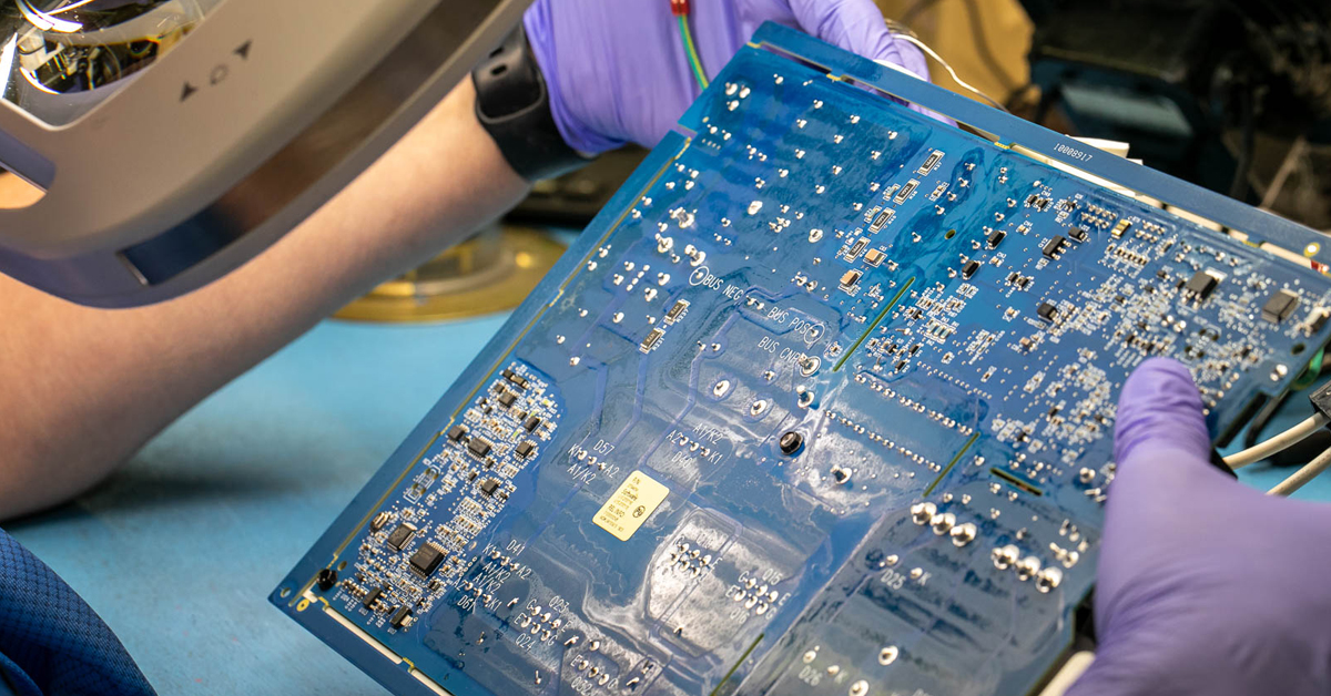 Visual inspection of a completed PCBA.