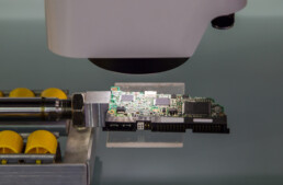 Machine camera assessing PCB for imperfections or mistakes